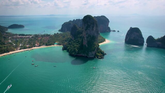 Panoramic aerial view of the popular Railay Beach and Phra Nang at Krabi, Thailand, surrounded by lush jungle and emerald sea