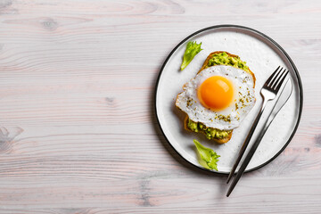 Avocado toast with fried egg