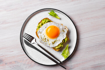 Avocado toast with fried egg