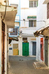 Fototapeta premium Charming street with colorful doors in Moulay Idriss, Morocco, Africa