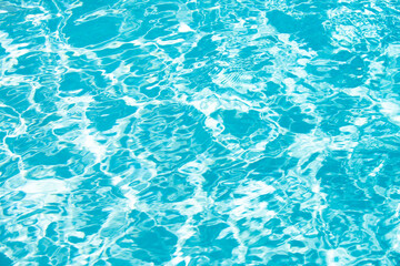 Water in swimming pool, background with high resolution. Wave abstract or rippled water texture.