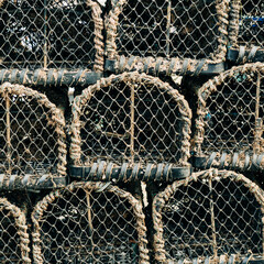 Crab fishing crates for catching and trapping with ropes and anchor