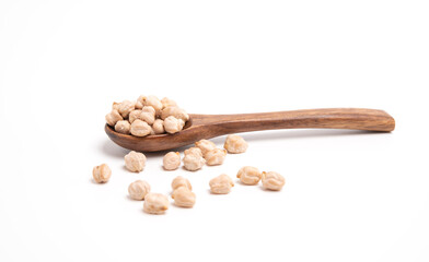 Chickpeas on wooden spoon isolated on white background