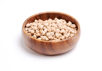 Close up uncooked chickpeas in wooden bowl. Healthy food concept