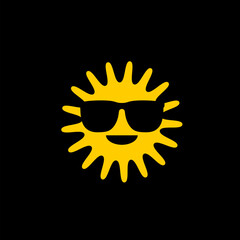 Funny sun with sunglasses icon isolated on black background.