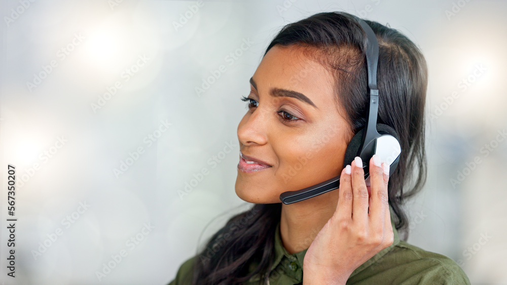Poster Happy female customer service agent smiling while working in a call centre and talking to a client with a headset. A helpful saleswoman assisting customers with purchase orders and questions online