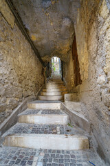 An old atmospheric city with narrow and cramped quiet streets and stairs