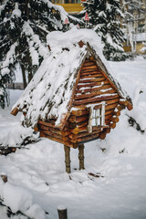 A wooden hut on chicken legs in the woods