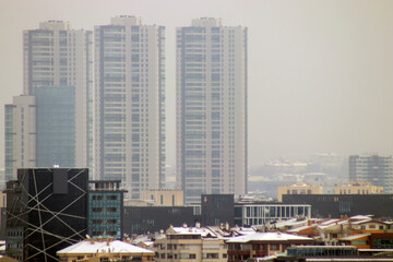 big modern buildings in snowy weather, cityscape
