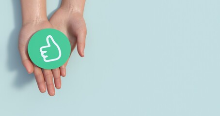 Hands holding green happy smile face paper cut, good feedback rating,think positive, customer review, assessment, child wellness,world mental health day, Compliment Day