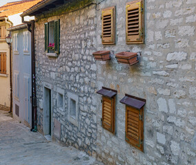 An old atmospheric city with narrow and cramped quiet streets and stairs