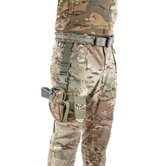 Soldier wearing uniform with gun in holster. Military concept. Armed forces equipment.