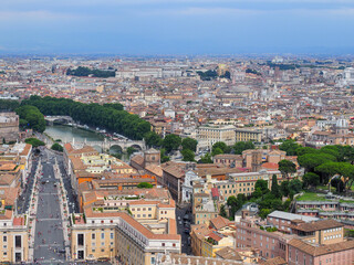 Cityscape of Rome and stormy, cloudy sky. Storm is coming. Rainy day in Capital of Italy. Panoramic view.