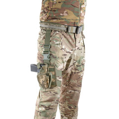 Soldier wearing uniform with gun in holster. Military concept. Armed forces equipment.