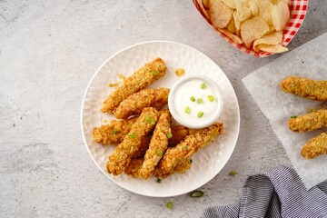 Potato chips breaded Chicken strips | Game day appetizers, selective focus
