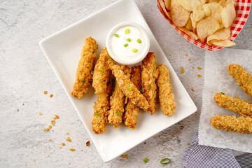 Potato chips breaded Chicken strips | Game day appetizers, selective focus