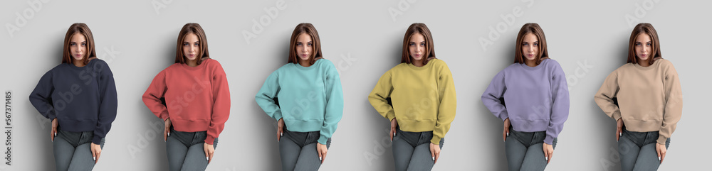 Wall mural Template of colored crop sweatshirt on a posing girl, for design, advertising, branding, front.