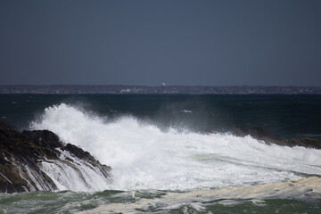 Ocean waves splashing on a rocky shore