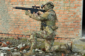 Infantry soldier shooting during military combat training.