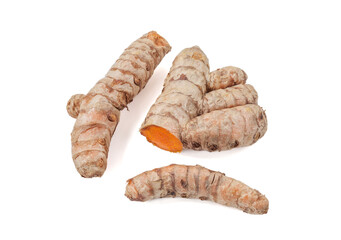 Close-up of turmeric roots isolated on white background