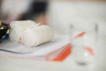 Fototapeta na wymiar elastic bandage. Two elastic bandages for dressing close-up lie on the table. 