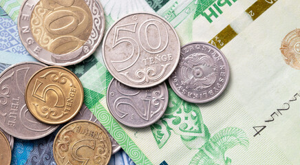 Coins on Tenge banknotes of Kazakhstan.