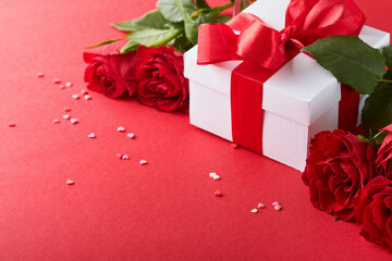 Valentines Day or Romantic dinner concept. Romantic table setting, silverware, wine glasses, gift...