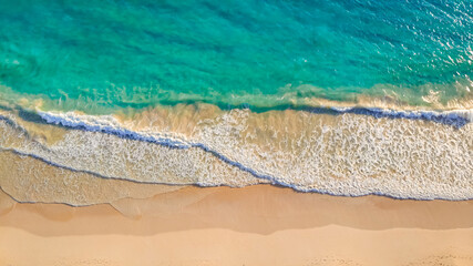Top view of ocean coastline with sandy beach