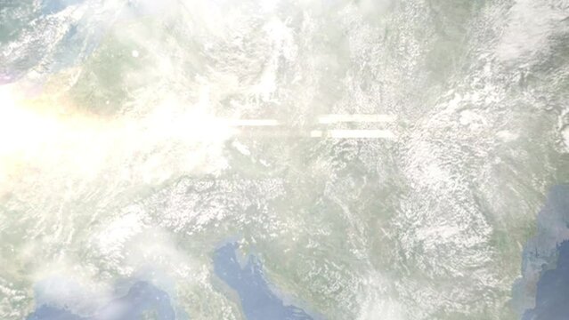Earth zoom in from outer space to city. Zooming on Hollabrunn, Austria. The animation continues by zoom out through clouds and atmosphere into space. Images from NASA