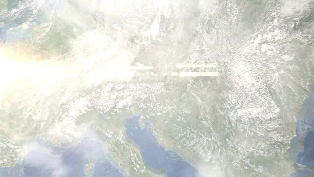 Earth zoom in from outer space to city. Zooming on Kapfenberg, Austria. The animation continues by zoom out through clouds and atmosphere into space. Images from NASA
