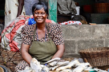 portrait of a smiling woman at the market