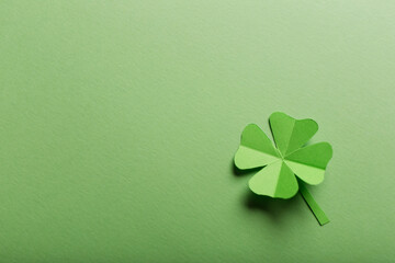 St. patrick's day. green background with clover leave four-leafed. copy space. Paper craft