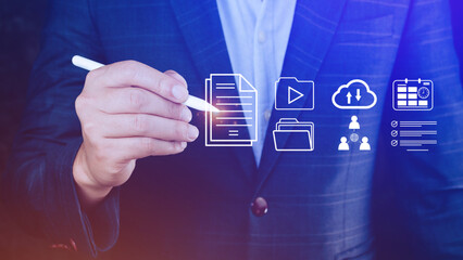 Document Management System (DMS) being setup IT consultant working on laptop computer in office, Software for archiving, searching and managing corporate files information