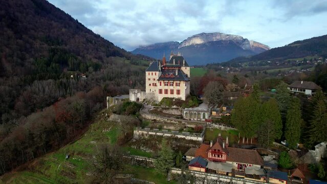 Most beautiful medieval castles of France - Menthon located near lake Annecy. aerial view .Menthon-Saint-Bernard