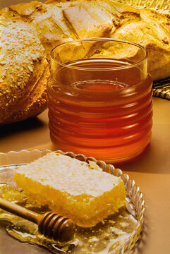 glass jar, comb honey and honey