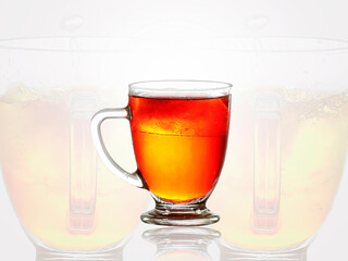 A glass of cola drink with ice cubes on white background