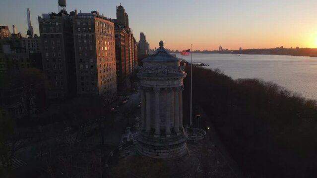 sunset flying counter clockwise around Soldiers and Sailors Monument in Riverside Park NYC