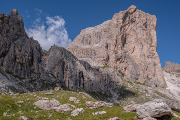 Fototapeta premium Sforcella and Mugoni South and East summits with Zigolade pass as seen from Ciampaz saddle, near Roda di Vael refuge, in the middle of Catinaccio/Rosengarten mountain massif, Dolomites, Italy