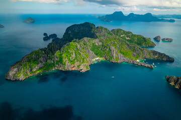 Amazing reef and mountains in the sea of Palawan, Philippines (aerial view)