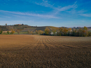 Plowed fields in late autumn. Piedmont region, Italy.