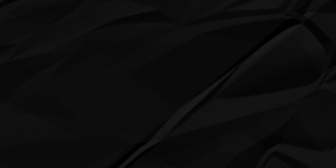 Fototapeta premium Black crumpled paper texture background. A crumpled sheet of dark gray paper abstract background. Black wrinkled paper texture for design. 
