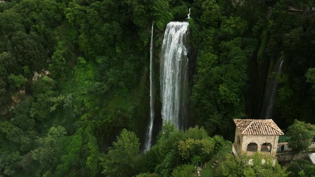 Beautiful View Of Marmore Falls (Cascata delle Marmore) With Surrounding Lush Vegetation, The World's Tallest Man-Made Waterfall In The Umbria Region, Italy. - Wide Shot