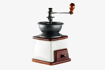 Closeup image of manual wooden coffee grinder isolated at white background.