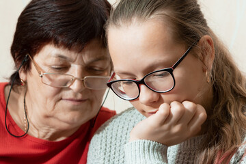 Grandmother is very happy with her granddaughter, family