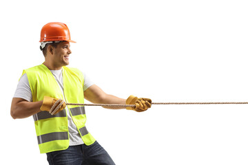 Construction worker pulling a rope - Powered by Adobe