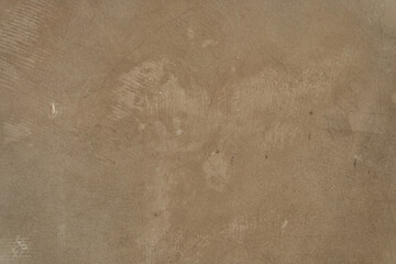 Overlay for your design with space to copy. Brown concrete stone of rough texture. Brown texture of concrete, cement stone wall, wall surface of an old building. High quality photo
