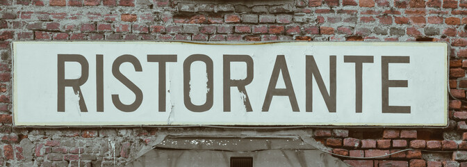 Old vintage restaurant sign in Italy - Concept of retro, traditional Ristorante design