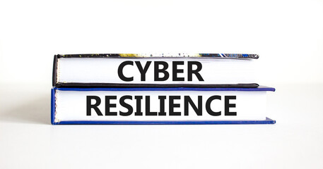 Cyber resilience symbol. Concept word Cyber resilience typed on books. Beautiful white table white background. Business and cyber resilience concept. Copy space.