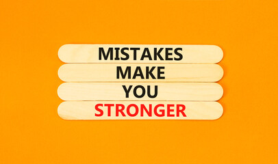 Mistake make stronger symbol. Concept words Mistakes make you stronger on wooden stick. Beautiful...