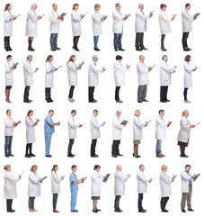 Fototapeta na wymiar full length group of doctors with notepad isolated